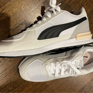 NWOT Puma Neutral tones sneaker. Never worn. No tags. No box. Size 7.5